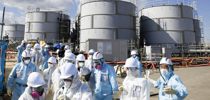 Journalister besöker kärnkraftverket i Fukushima fem år efter katastrofen. Foto: Toru Hanai/Pool Photo via AP/TT.